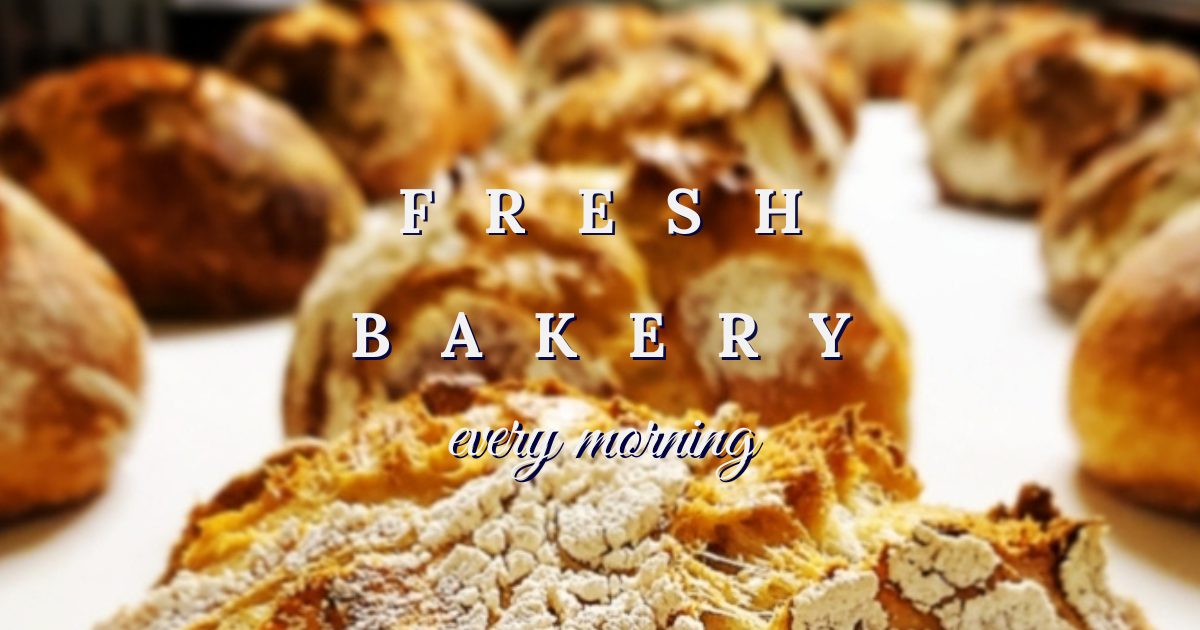 Fresh bakery every morning — sourdough loaves on the bench